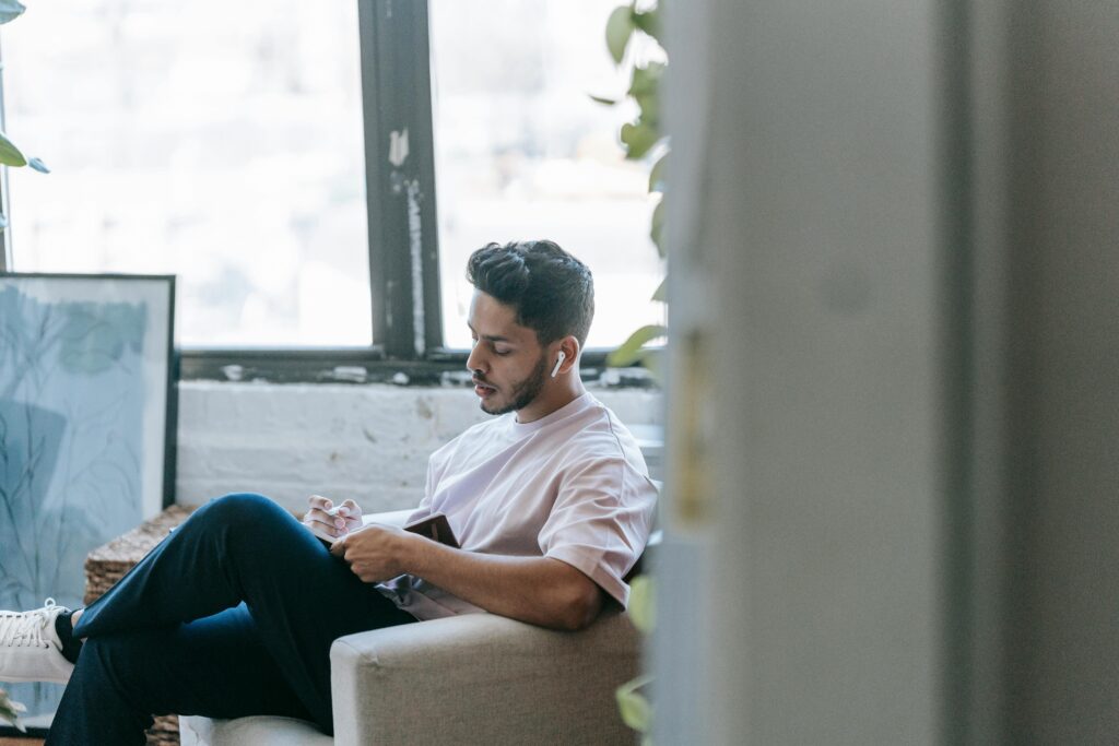 man writing a song 