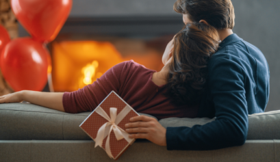 A happy couple exchanging thoughtful gifts, celebrating love and appreciation on Valentine's Day.